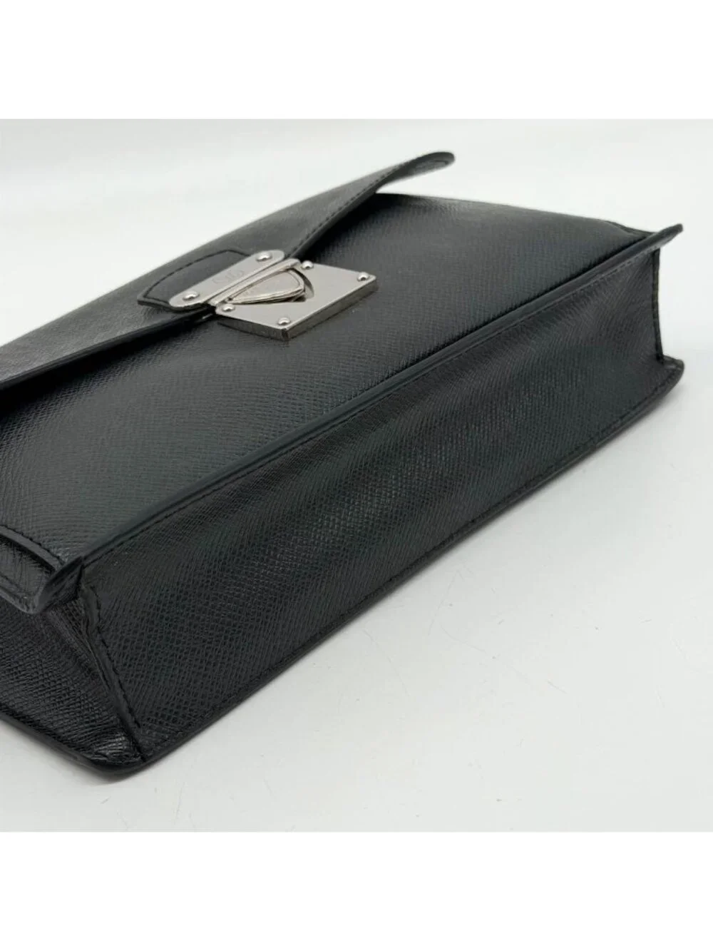 Louis Vuitton Belaia Taiga Clutch Leather